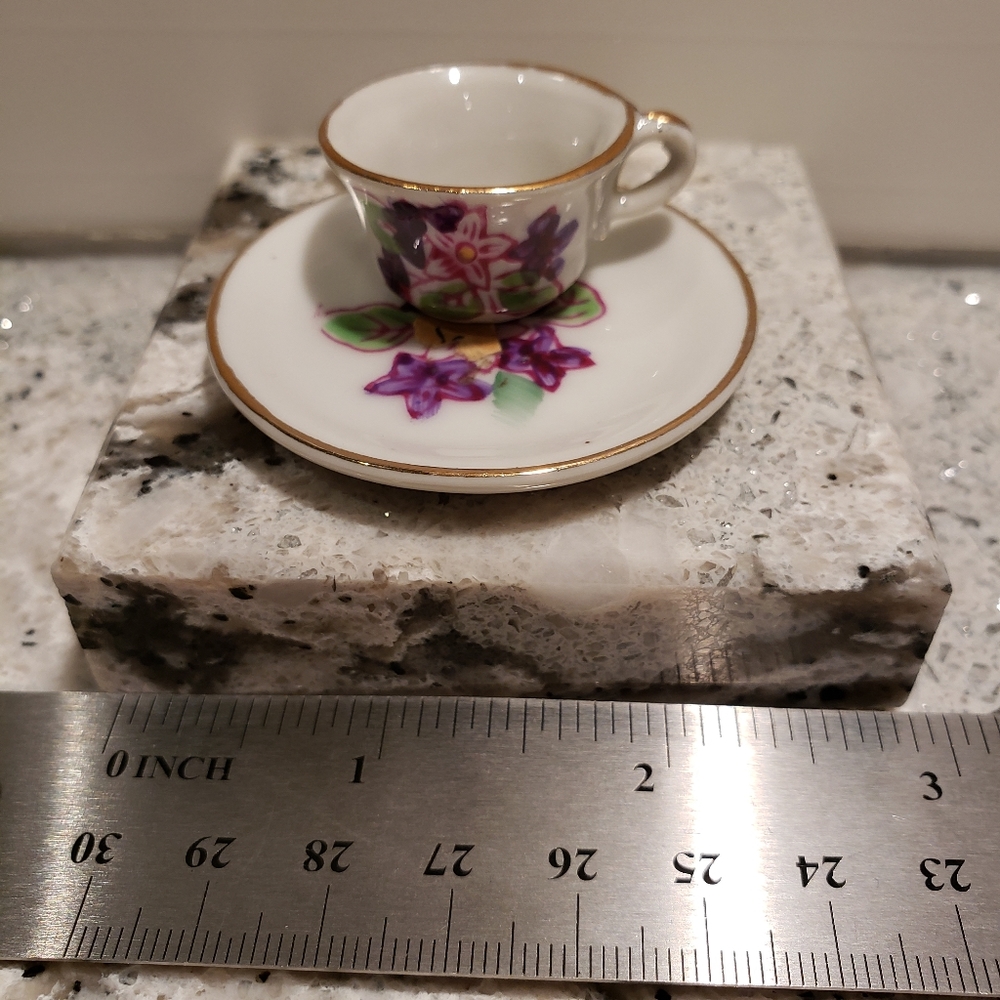 Smallest antique porcelain tea cup made in Japan.